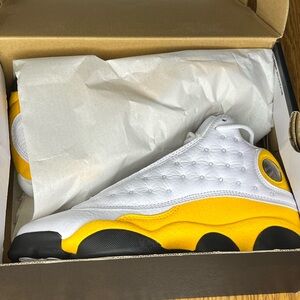 Jordan White and Yellow High-Top Sneakers with Holographic Detail